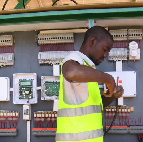 electrician working on electrical panels
