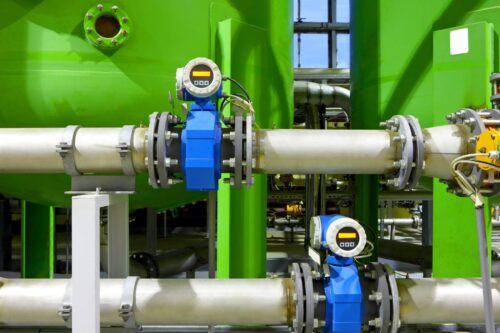 chemical factory tanks with pipes