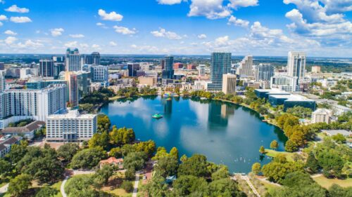 city with a lake and greenery