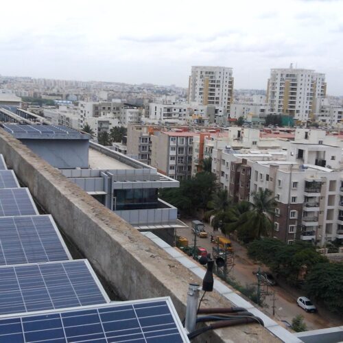 cityscape showing rooftop solar