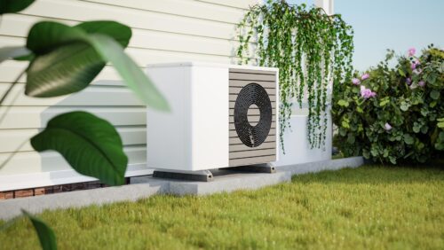 heat pump installed beside a home
