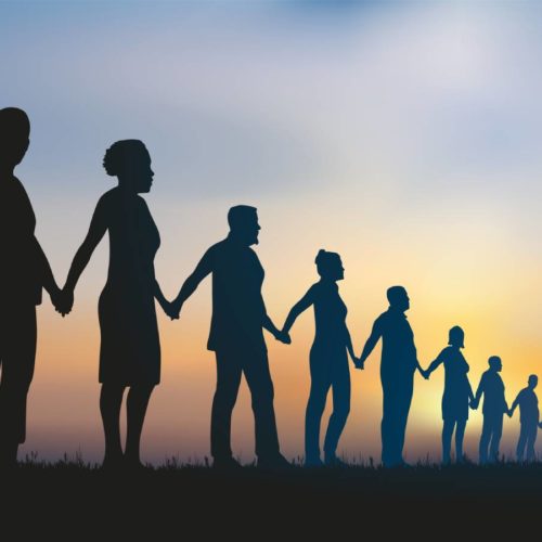 people holding hands in solidarity