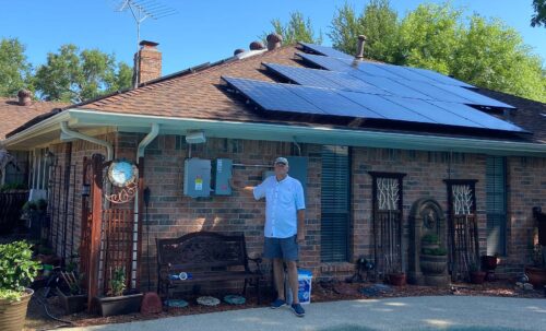 Terry Morris with his newly installed solar system in Plano, Texas Photo courtesy Sun United Neighbors